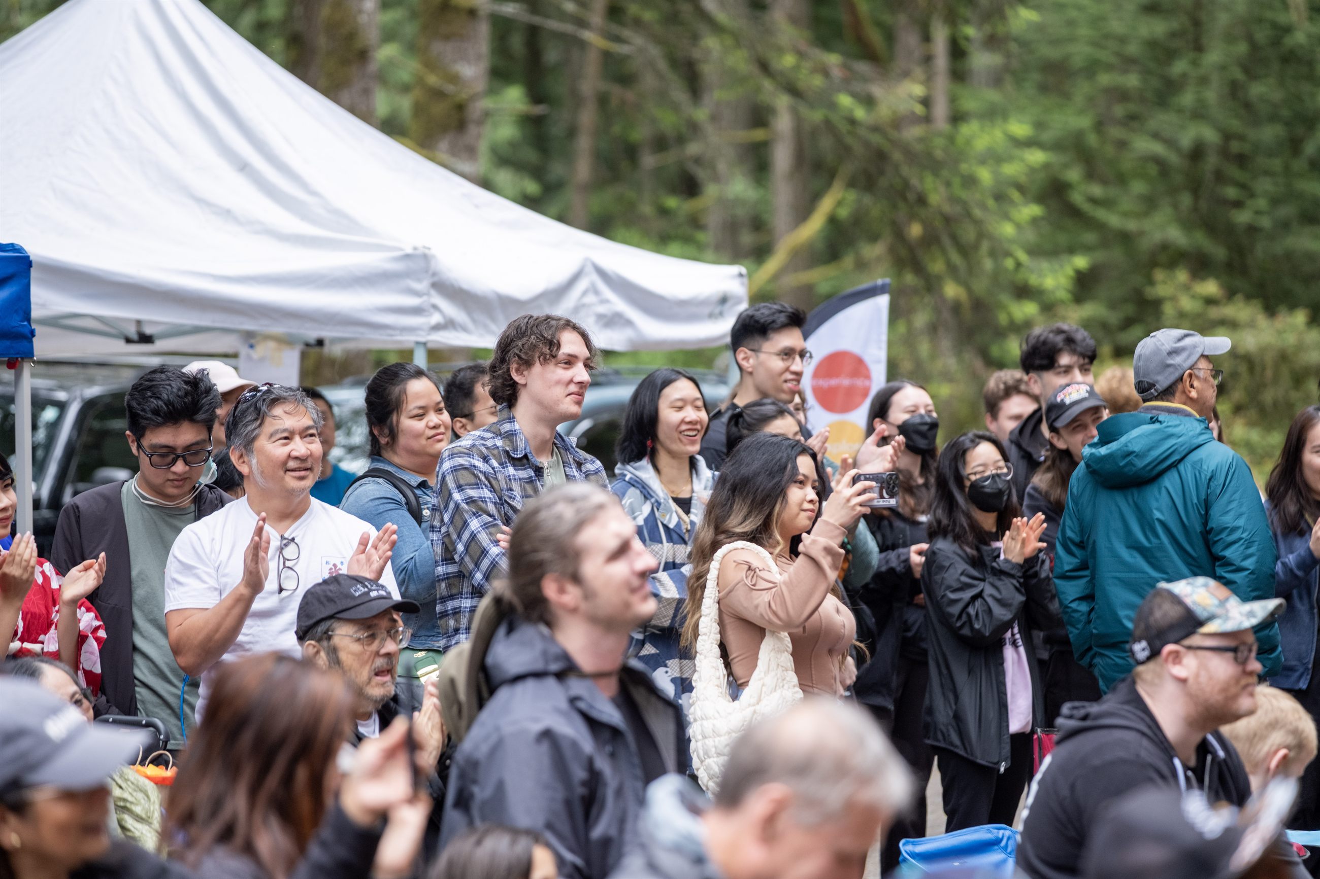 Festival volunteers and production teams coordinating on-site support.